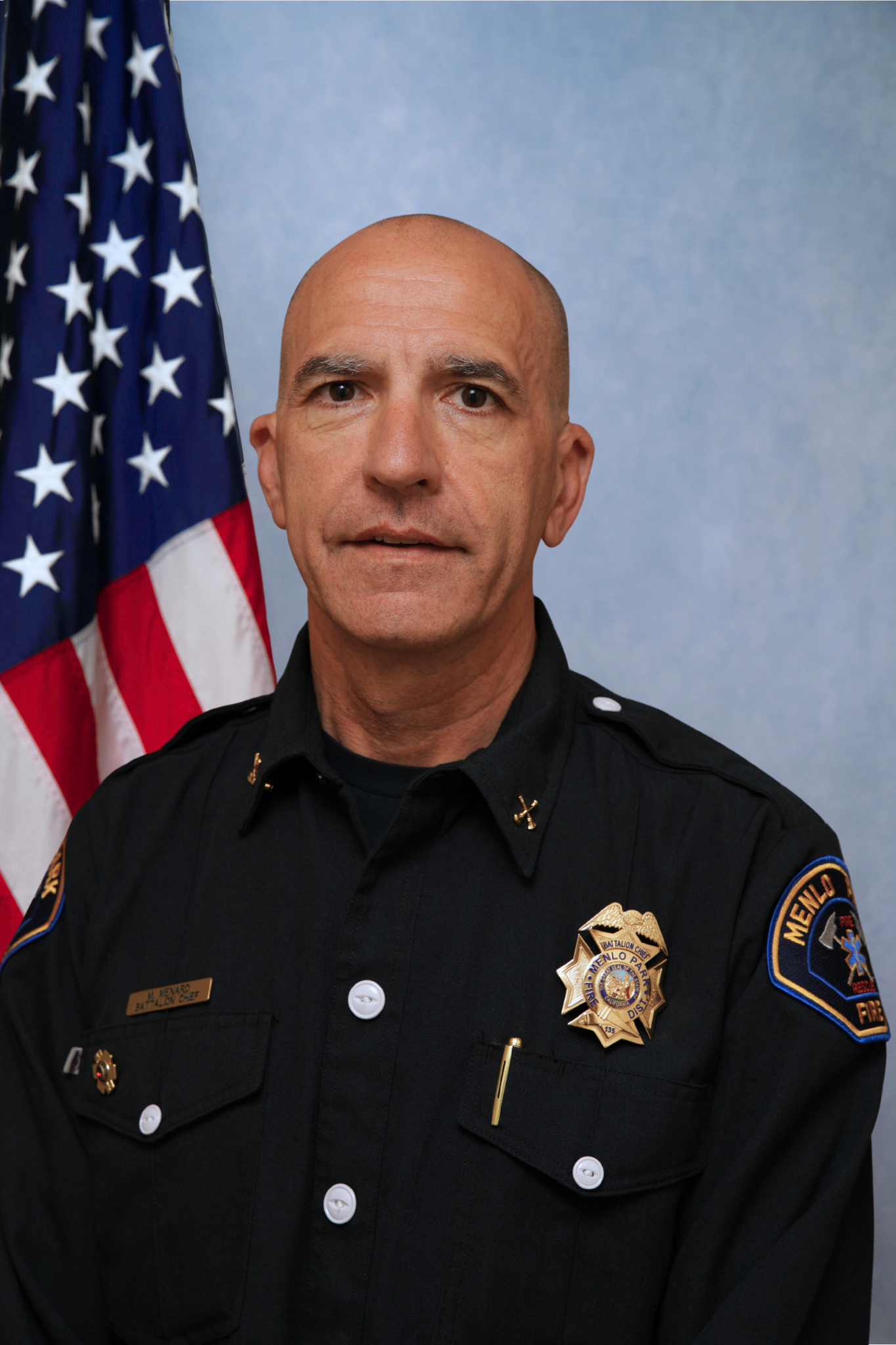 Portrait of Matt Menard, smiling.